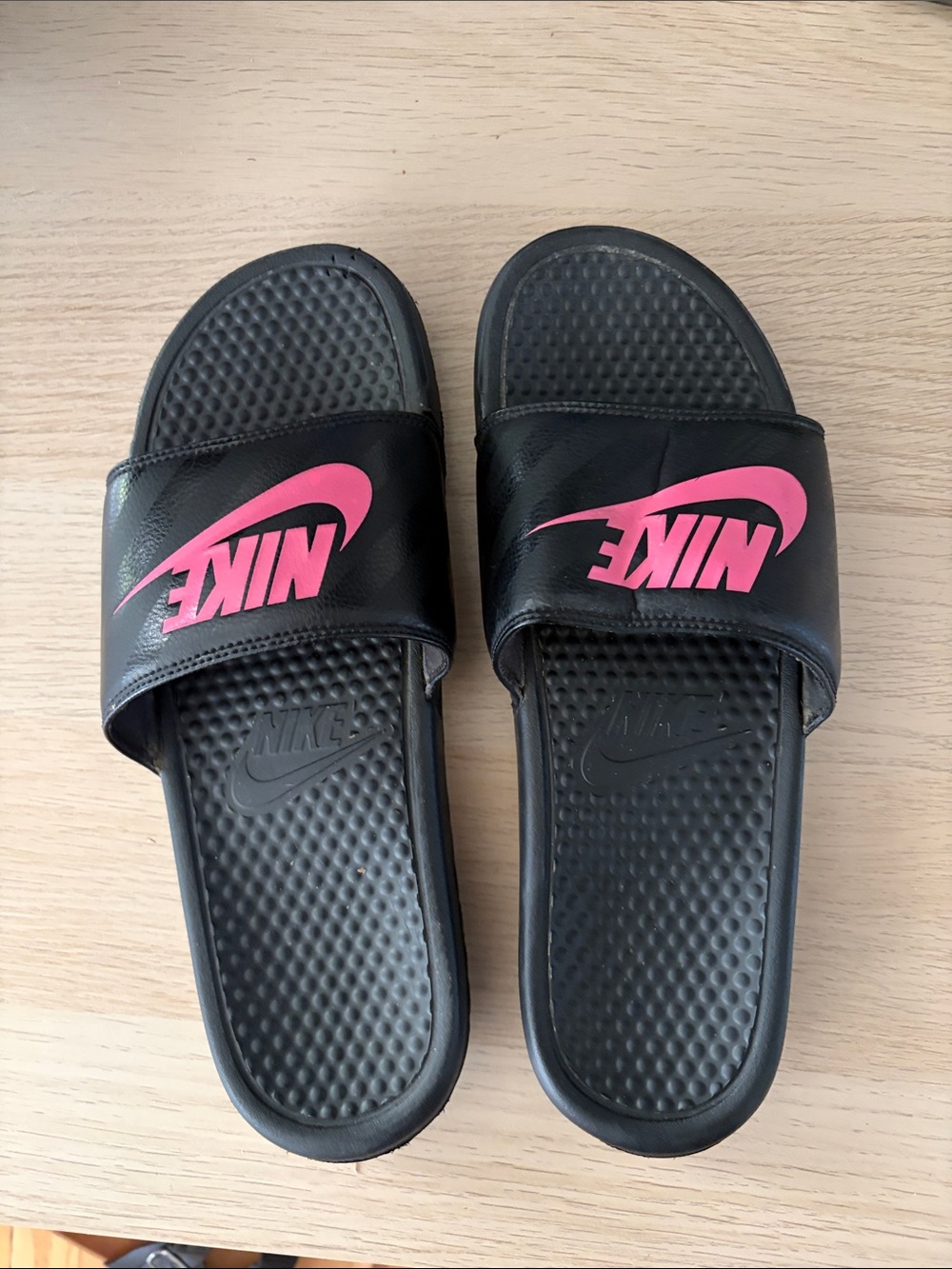 Nike Women's Black Slide Sandals with Pink Swoosh